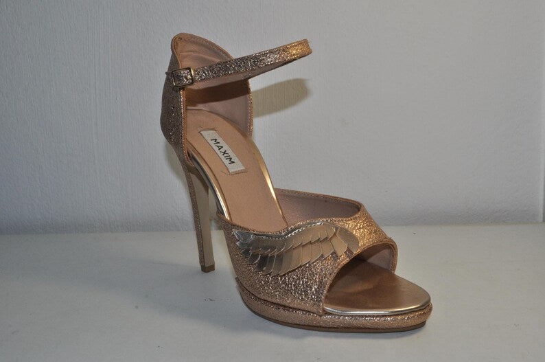 “Women’s Gold High Heel Sandals with Angel Wings Detail – Chic Luxury Evening Heels”