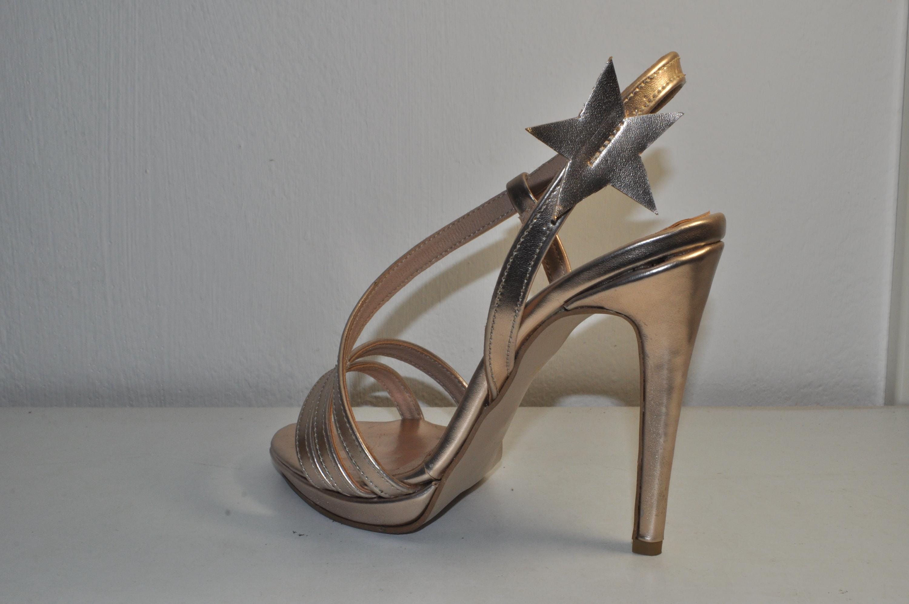 “Women’s Handmade Golden Leather High Heel Sandals with Star Detail – Chic Luxury Evening Heels”