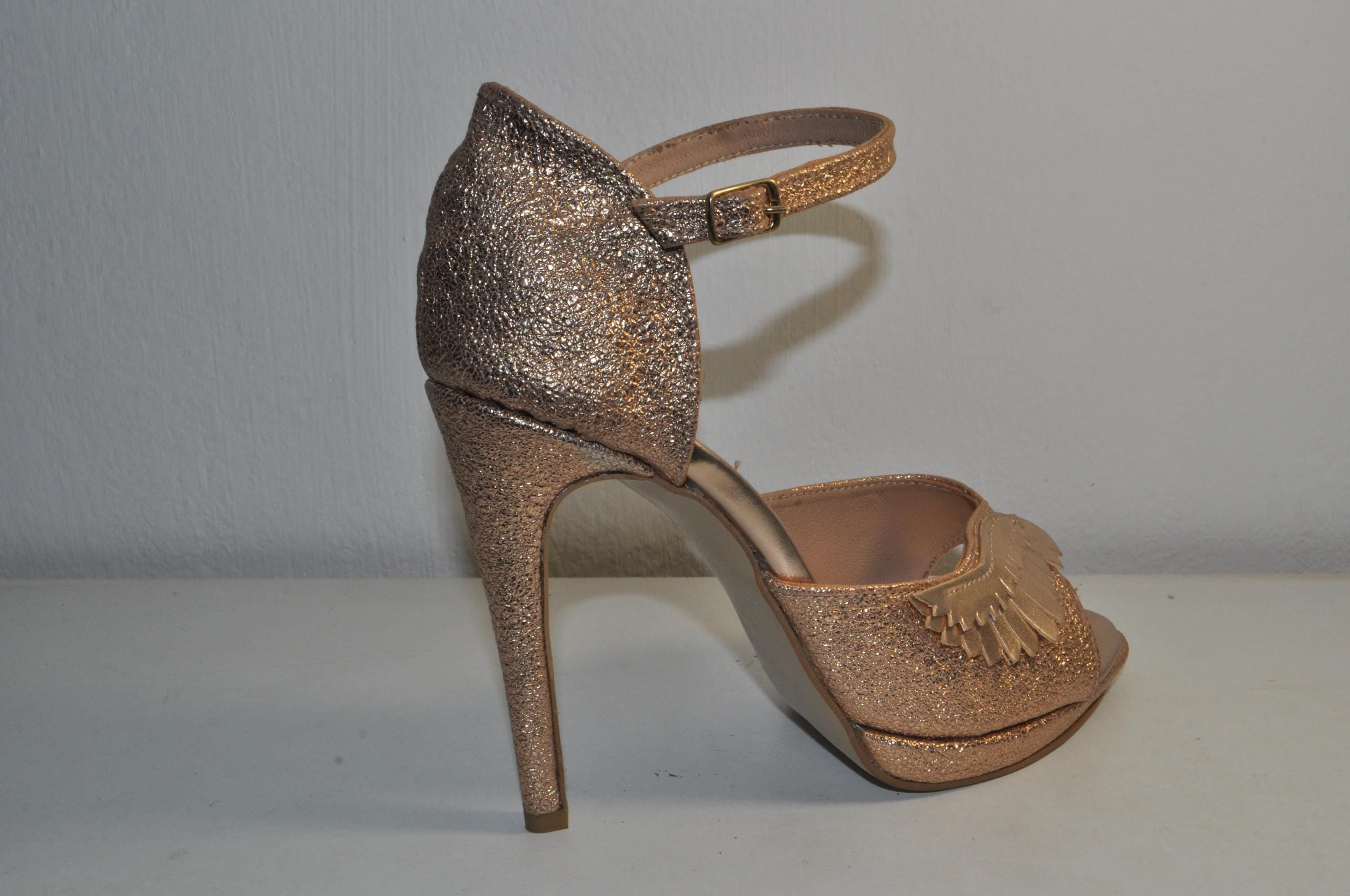 “Women’s Gold High Heel Sandals with Angel Wings Detail – Chic Luxury Evening Heels”