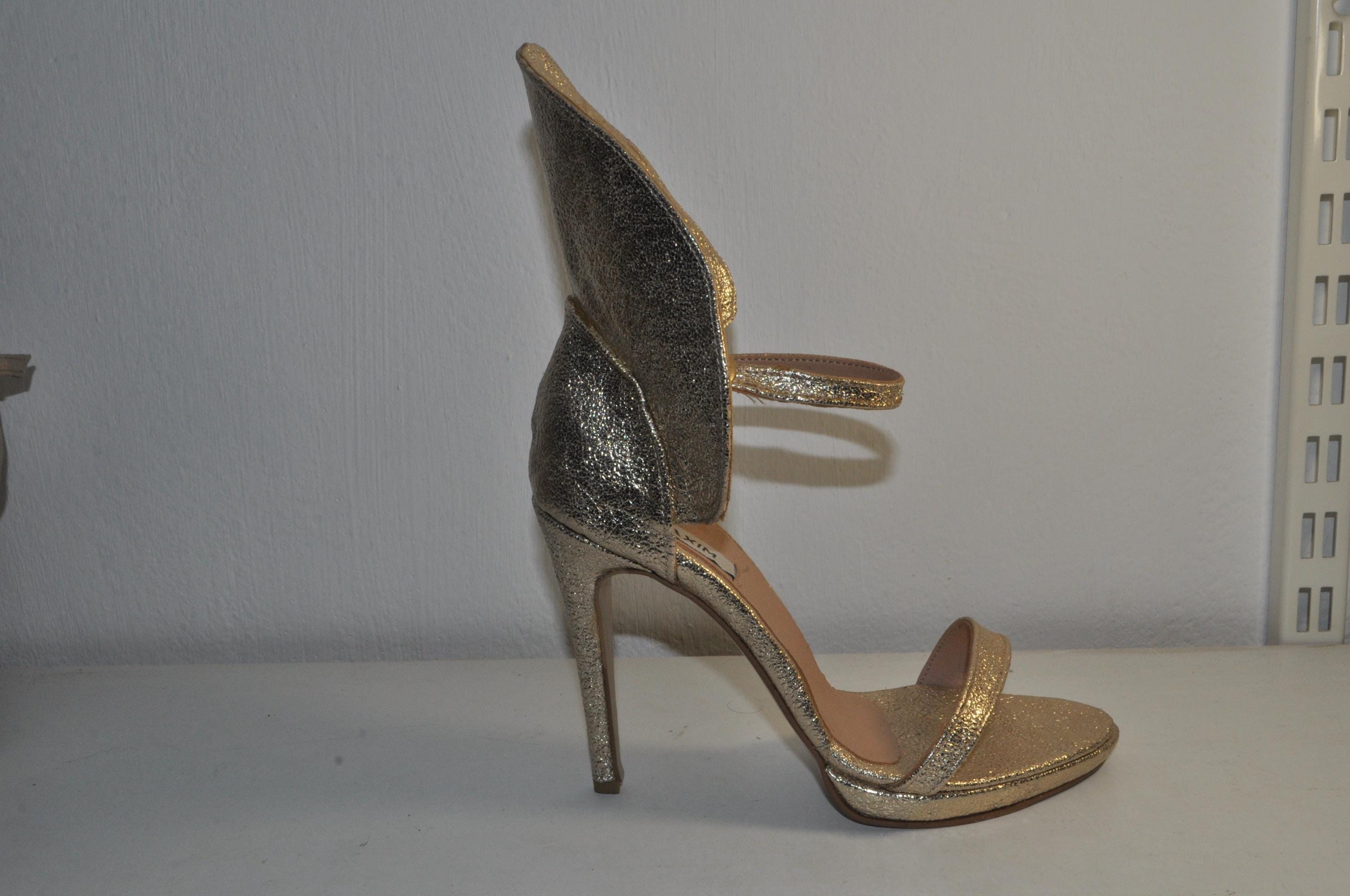 “Luxury Women’s Gold High Heel Sandals – Elegant Evening Heels”