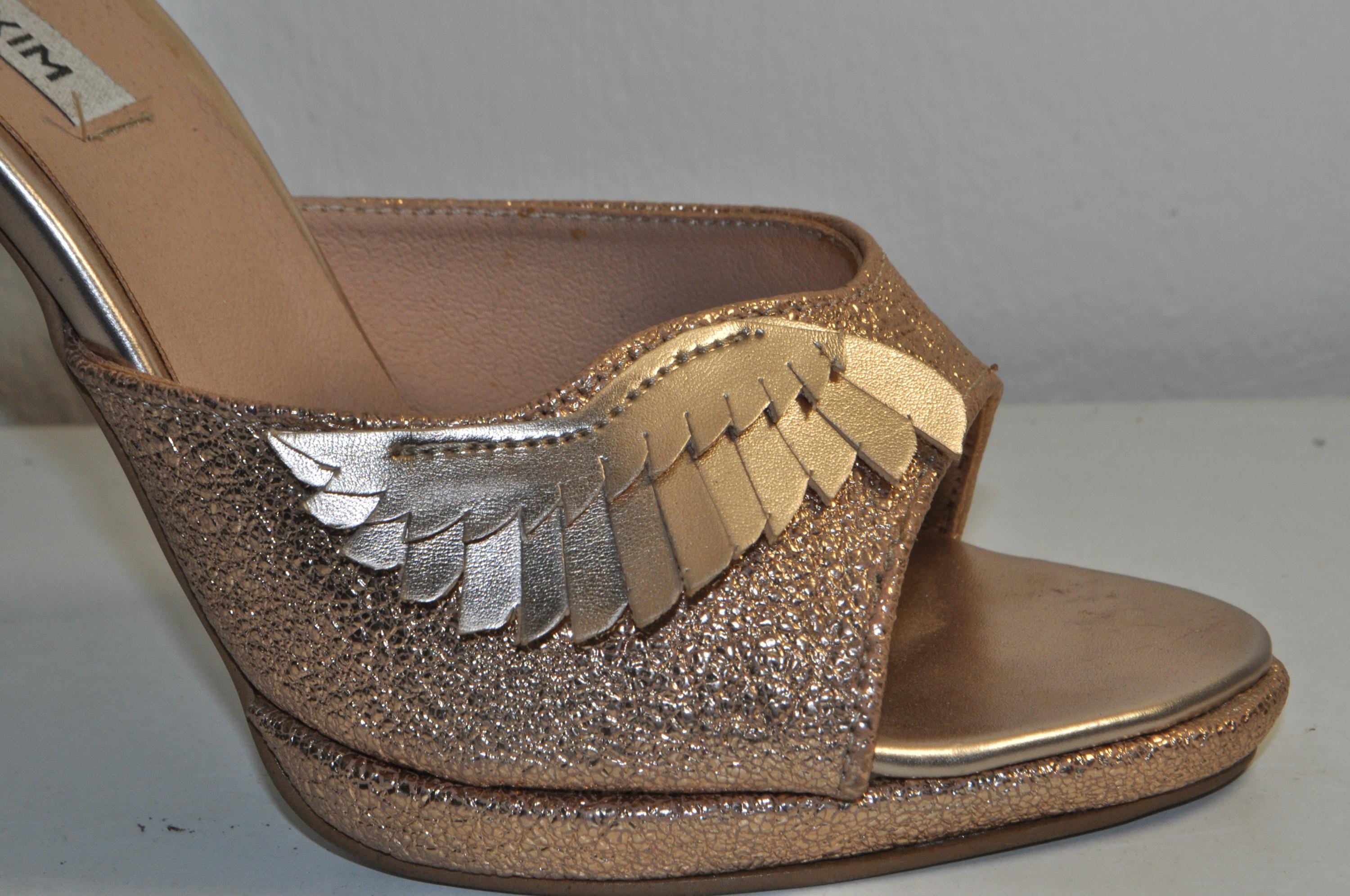 “Women’s Gold High Heel Sandals with Angel Wings Detail – Chic Luxury Evening Heels”
